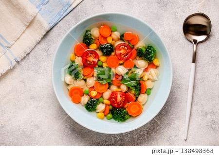 Soup with mini dumplings and vegetables. Soup with mini dumplings and vegetables. 138498368