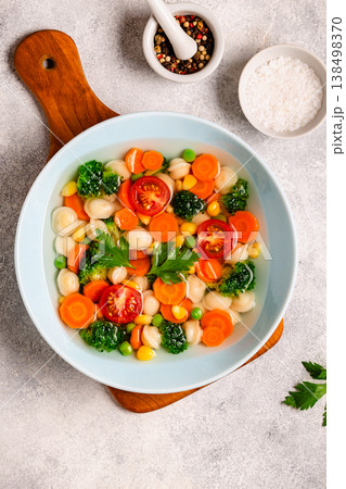 Soup with mini dumplings and vegetables. Soup with mini dumplings and vegetables. 138498370
