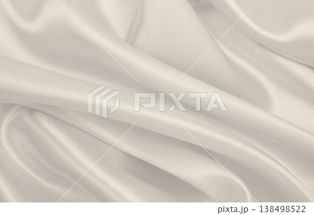 Smooth elegant golden silk or satin luxury cloth texture as wedding background. Luxurious background design. In Sepia toned. Retro style Smooth elegant golden silk or satin luxury cloth texture as wedding background. Luxurious background design. In Sepia toned. Retro style 138498522
