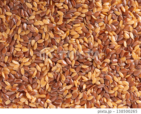 Flax seed mix background. Golden and brown linseed or flaxseed. Flax seed mix background. Golden and brown linseed or flaxseed. 138500265