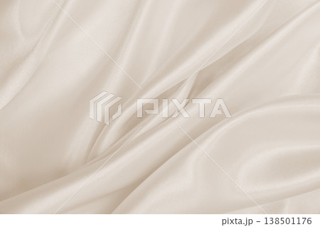 Smooth elegant golden silk or satin luxury cloth texture as wedding background. Luxurious background design. In Sepia toned. Retro style Smooth elegant golden silk or satin luxury cloth texture as wedding background. Luxurious background design. In Sepia toned. Retro style 138501176
