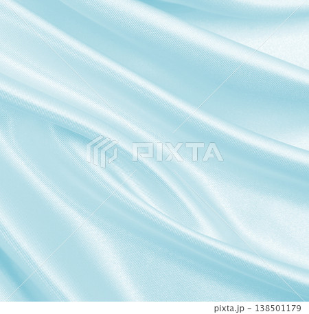 Smooth elegant blue silk or satin luxury cloth texture as abstract background. Luxurious background design 138501179
