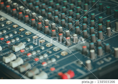Mixing console. Audio mixer. Green tint of light 138503166