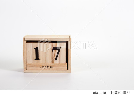 Wooden calendar June 17 on a white background 138503875