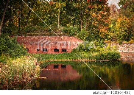 Brick wall of Fort 5 King Frederick William III by moat in Kaliningrad. Russia Brick wall of Fort 5 King Frederick William III by moat in Kaliningrad. Russia 138504485