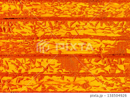 Old peeling orange bright paint wood plank messy board abstract wooden surface obsolete texture weathered background 138504926