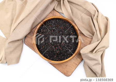 Dried Isot Pepper Flakes in a Wooden Bowl Isolated on White Background - Traditional Turkish Chili 138508369