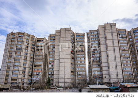 Multi-story residential buildings with faded balconies Multi-story residential buildings with faded balconies 138508418
