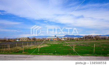 Birds soar above countryside homes Birds soar above countryside homes 138508558