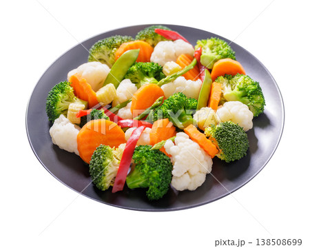 plate of mix of steamed vegetables on white background 138508699