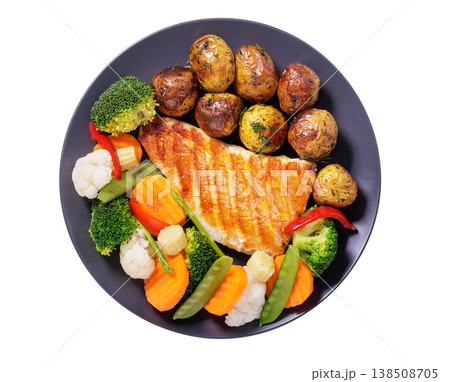 plate of grilled chicken with steamed vegetables and baked potatoes isolated on white background plate of grilled chicken with steamed vegetables and baked potatoes isolated on white background 138508705