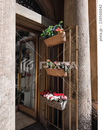 Flower shop in prague displaying colorful flowers in wicker baskets Flower shop in prague displaying colorful flowers in wicker baskets 138508842