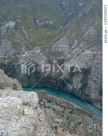 Aerial landscape of Sulak Canyon sheer cliffs and winding river - Dagestan natural wonder from above, Russia 138508921