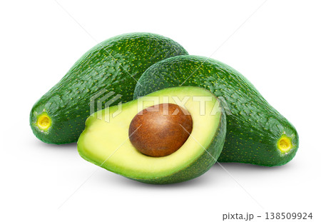 Green fresh avocado with cut in half with seed isolated on white background. 138509924