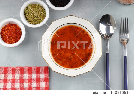 Traditional Turkish Orzo Soup with Tomato Paste and Dried Mint, Warm Homemade Vegetable Broth Base 138510633