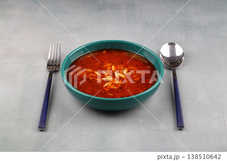 Traditional Turkish Orzo Soup with Tomato Paste and Dried Mint, Warm Homemade Vegetable Broth Base Traditional Turkish Orzo Soup with Tomato Paste and Dried Mint, Warm Homemade Vegetable Broth Base 138510642