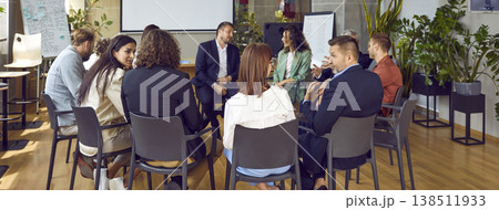 Diverse business colleagues employees brainstorming, team training therapy psychology on success Diverse business colleagues employees brainstorming, team training therapy psychology on success 138511933