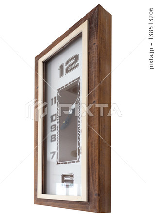 A large clock mounted on a white wall A large clock mounted on a white wall 138513206