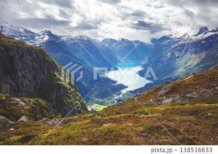 Aerial view from Hoven Mount of the beautiful valley and Lovatnet Lake on a cloudy day. Loen, Norway, Europe 138516633