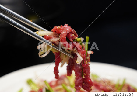 Korean style beef tartare, Yukhoe, seasoned with sesame oil and herbs Korean style beef tartare, Yukhoe, seasoned with sesame oil and herbs 138518354