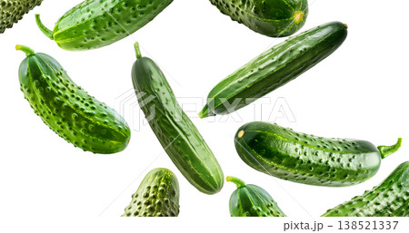 Multiple fresh green cucumbers arranged in a seamless pattern isolated on white background, healthy food and organic produce 138521337
