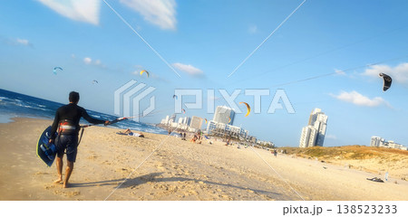 Beach and kite surfer in Israel. Soft focus. Beach and kite surfer in Israel. Soft focus. 138523233
