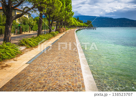 Great waterfront walkway and Lake Garda, Toscolano Maderno, Lombardy, Italy 138523707
