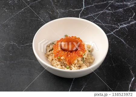 Japanese rice with caviar and marinated yolk 138523972