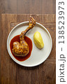 Roasted chicken leg with sauce and puree 138523973