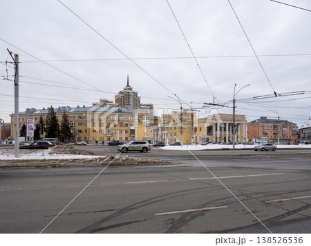 March 22 2026 Barnaul Russia October Square view toward the Altai Youth Theatre and Spire Building covered in snow cold early spring cityscape urban architecture and winter atmosphere. March 22 2026 Barnaul Russia October Square view toward the Altai Youth Theatre and Spire Building covered in snow cold early spring cityscape urban architecture and winter atmosphere. 138526536