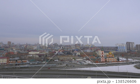 March 22 2026 Barnaul Russia aerial view of city with Old Bazaar and Znamensky Cathedral covered in snow cold early spring urban cityscape and winter atmosphere. March 22 2026 Barnaul Russia aerial view of city with Old Bazaar and Znamensky Cathedral covered in snow cold early spring urban cityscape and winter atmosphere. 138526606