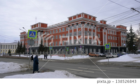 March 22 2026 Barnaul Russia Altai Krai Regional Court building covered in snow cold early spring cityscape urban architecture and winter atmosphere. March 22 2026 Barnaul Russia Altai Krai Regional Court building covered in snow cold early spring cityscape urban architecture and winter atmosphere. 138526843
