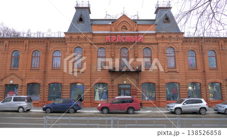 March 22 2026 Barnaul Russia Krasny Department Store early 20th century architectural monument covered in snow cold early spring cityscape urban architecture and winter atmosphere. March 22 2026 Barnaul Russia Krasny Department Store early 20th century architectural monument covered in snow cold early spring cityscape urban architecture and winter atmosphere. 138526858