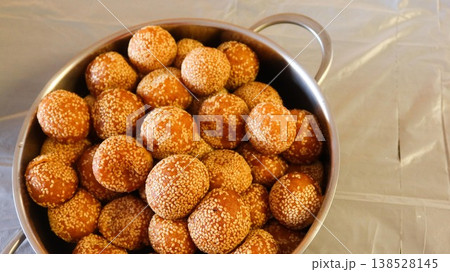 close up of many Chinese traditional festival snacks deep fried Sesame Ball (Jiandui)  138528145