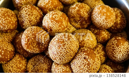 close up of many Chinese traditional festival snacks deep fried Sesame Ball (Jiandui)  138528148