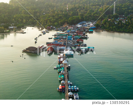 Top down aerial view of wooden houses and walkways in Bang Bao village, Thailand. Unique coastal architecture. 138530291