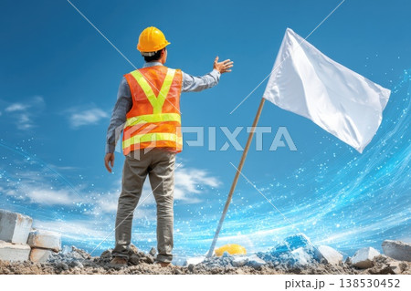 Construction Site View with Worker in Safety Gear Waving Flag Under Clear Blue Sky 138530452