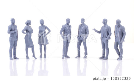 Miniature people in various poses gather together for a meeting or conversation in a bright setting Miniature people in various poses gather together for a meeting or conversation in a bright setting 138532329