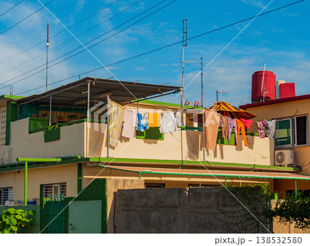 Clothes drying in the sun on terrace. Everyday Clothes drying in the sun on terrace. Everyday 138532580