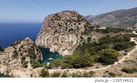 Rocky sea arch. A stunning view of the seashore. Rocky arch flowers. High quality 4k footage Rocky sea arch. A stunning view of the seashore. Rocky arch flowers. High quality 4k footage 138534621