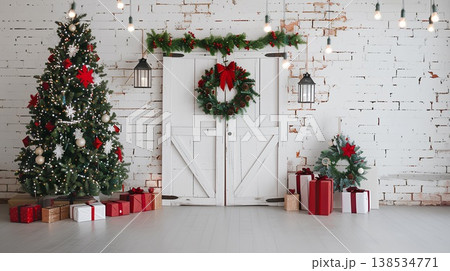 christmas photography backdrop, white wooden double doors with wreaths on the sides and red gift boxes at their feet, a christmas tree next to it with lights hanging from above 138534771