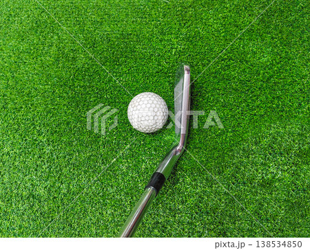 golf ball on green grass 138534850