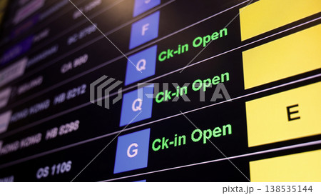Airport display board. Airport departure information board displaying boarding gate open check in status and cancelled flights. Ideal for travel aviation tourism delay and transportation concepts. 138535144