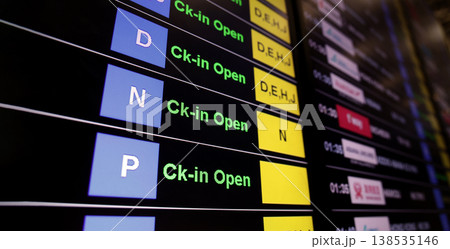 Airport display board. Airport departure information board displaying boarding gate open check in status and cancelled flights. Ideal for travel aviation tourism delay and transportation concepts. Airport display board. Airport departure information board displaying boarding gate open check in status and cancelled flights. Ideal for travel aviation tourism delay and transportation concepts. 138535146