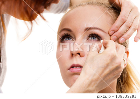 Makeup artist apply make up Makeup artist apply make up 138535293