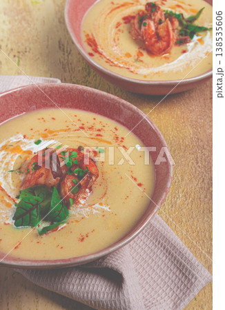pumpkin cream soup with shrimp, herbs and spices, homemade, no people, 138535606