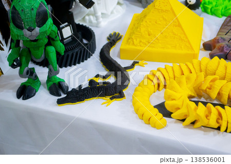 3D printed many different art objects. Objects printed on 3D printer from melted colored plastic. Models created on 3D printer from threads of molten plastic. Modern additive progressive technologies 138536001