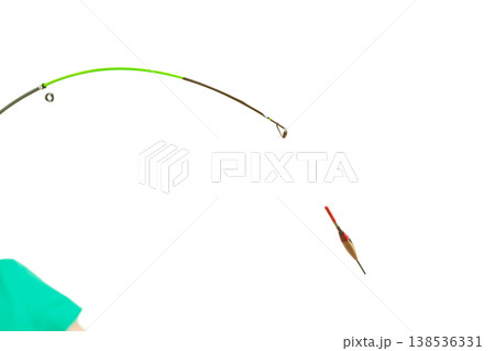 Person holding fishing rod, spinning equipment. Person holding fishing rod, spinning equipment. 138536331