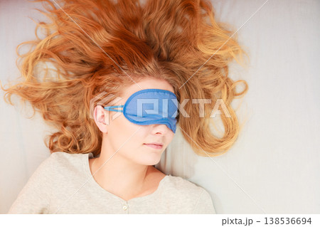 Sleeping woman wearing blindfold sleep mask. 138536694