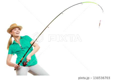 Woman with fishing rod, spinning equipment 138536703